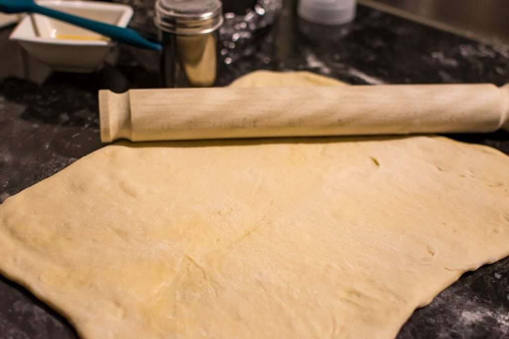 Rolled out sourdough ready for cinnamon sugar apple filling.