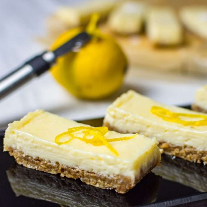 Lemon Slices on a black serving board.