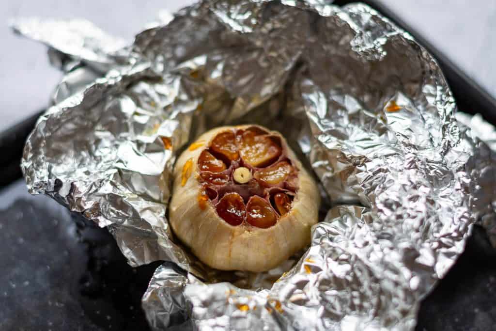 Roasted garlic in foil.