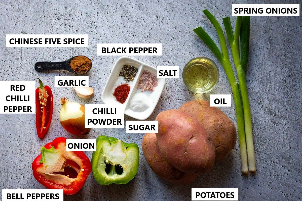 Ingredients for Salt and pepper chips on a light grey surface.