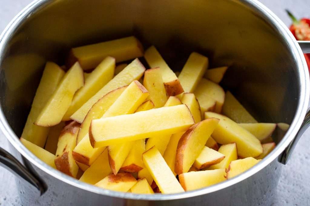 Potato chips in a large pot.