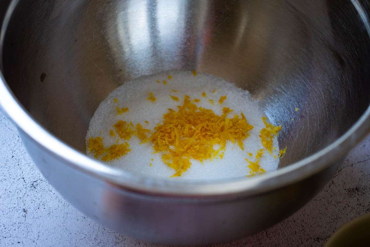 Lemon zest and sugar in a large mixing bowl.