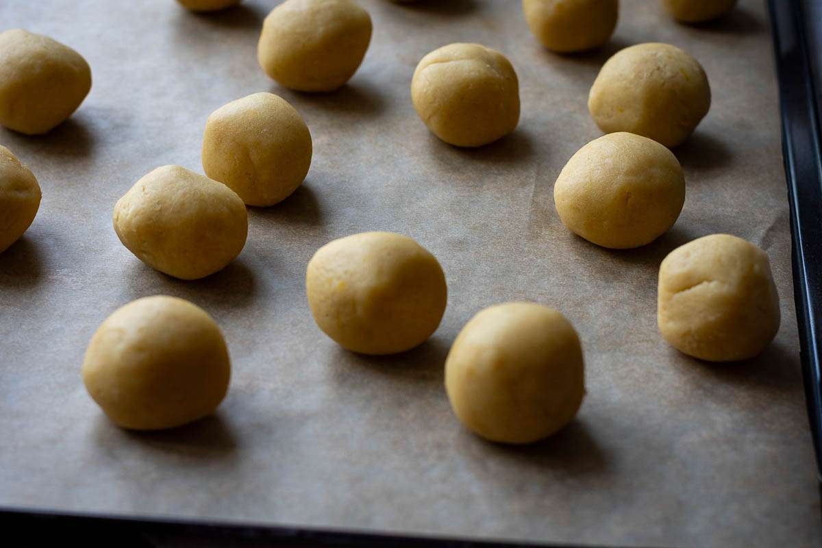 Small balls of lemon cookie dough.