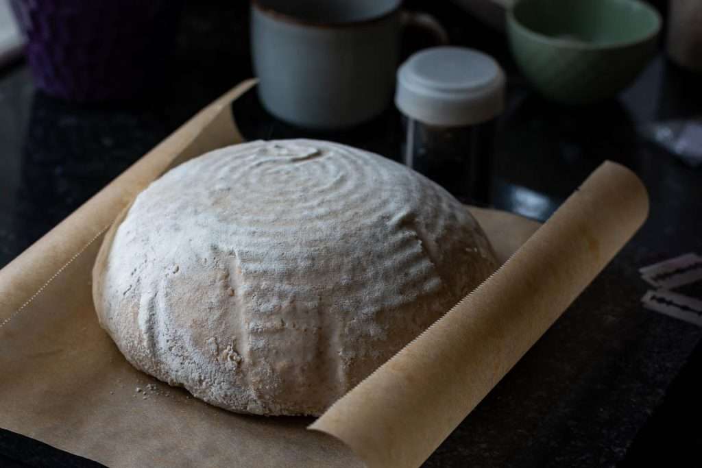 Sourodugh inversted onto a sheet of parchment paper.