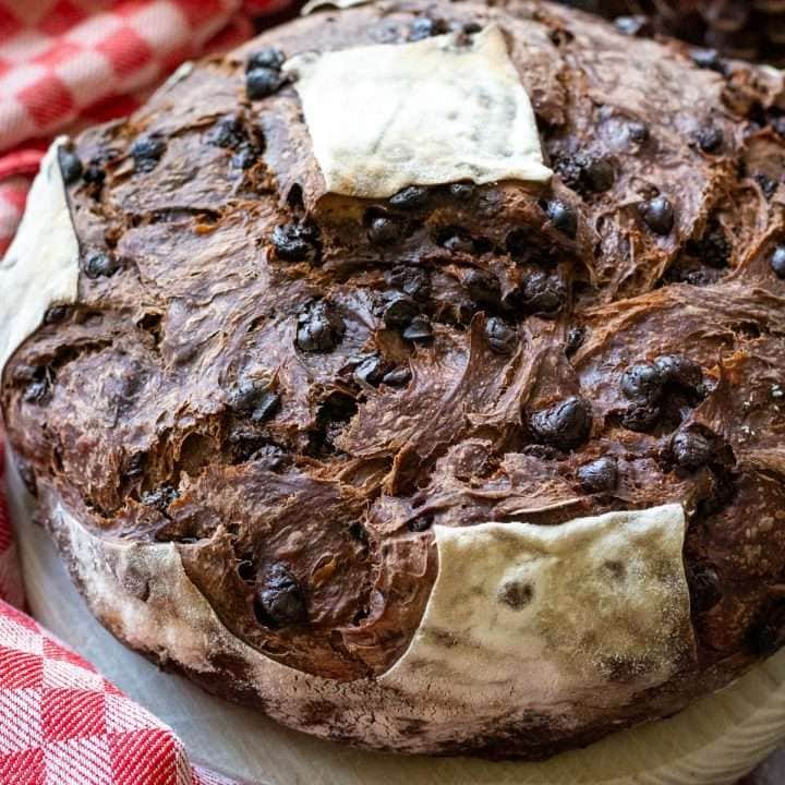 Double chocolate sourdough bread on a small wooden board.