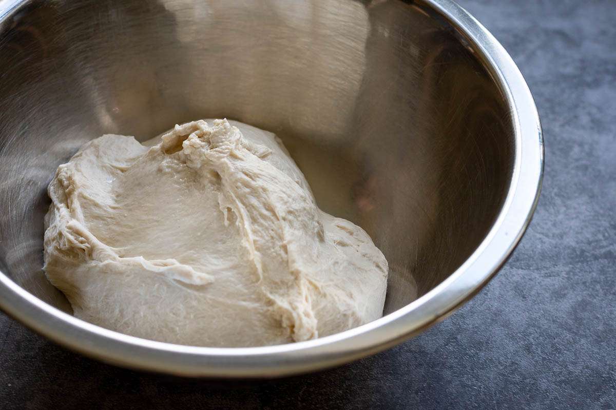 Sourdough in a metal bowl.
