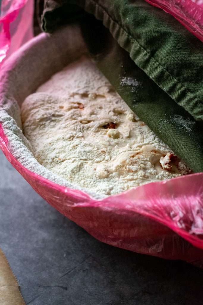 Sundried tomato and feta sorudough in a proofing basket.