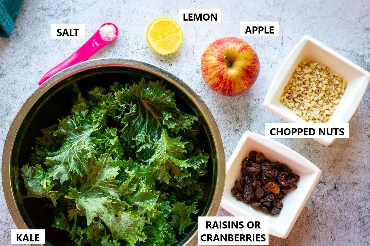 Ingredients for Kale and apple salad with walnuts.