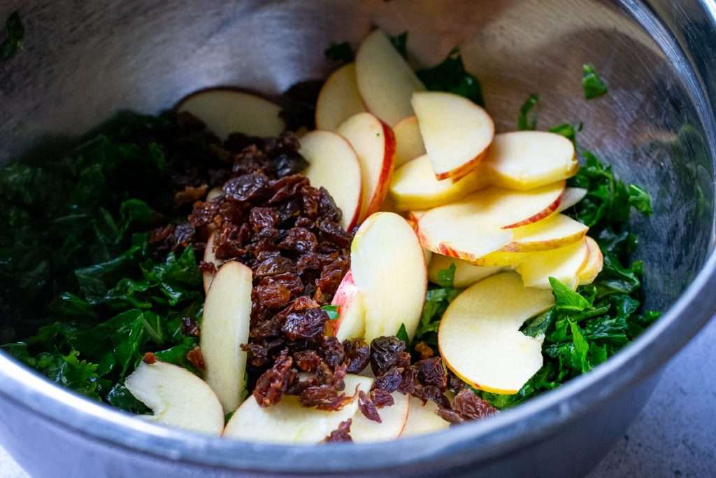 Apple slices and raisins added to the kale.