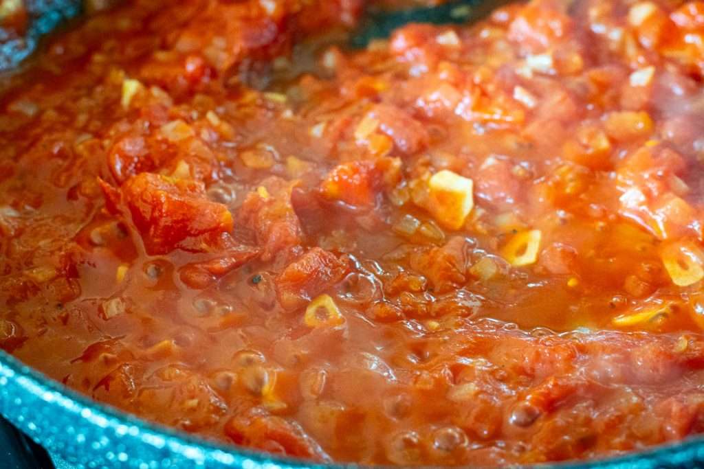 Reduced tomato sauce for the pasta.