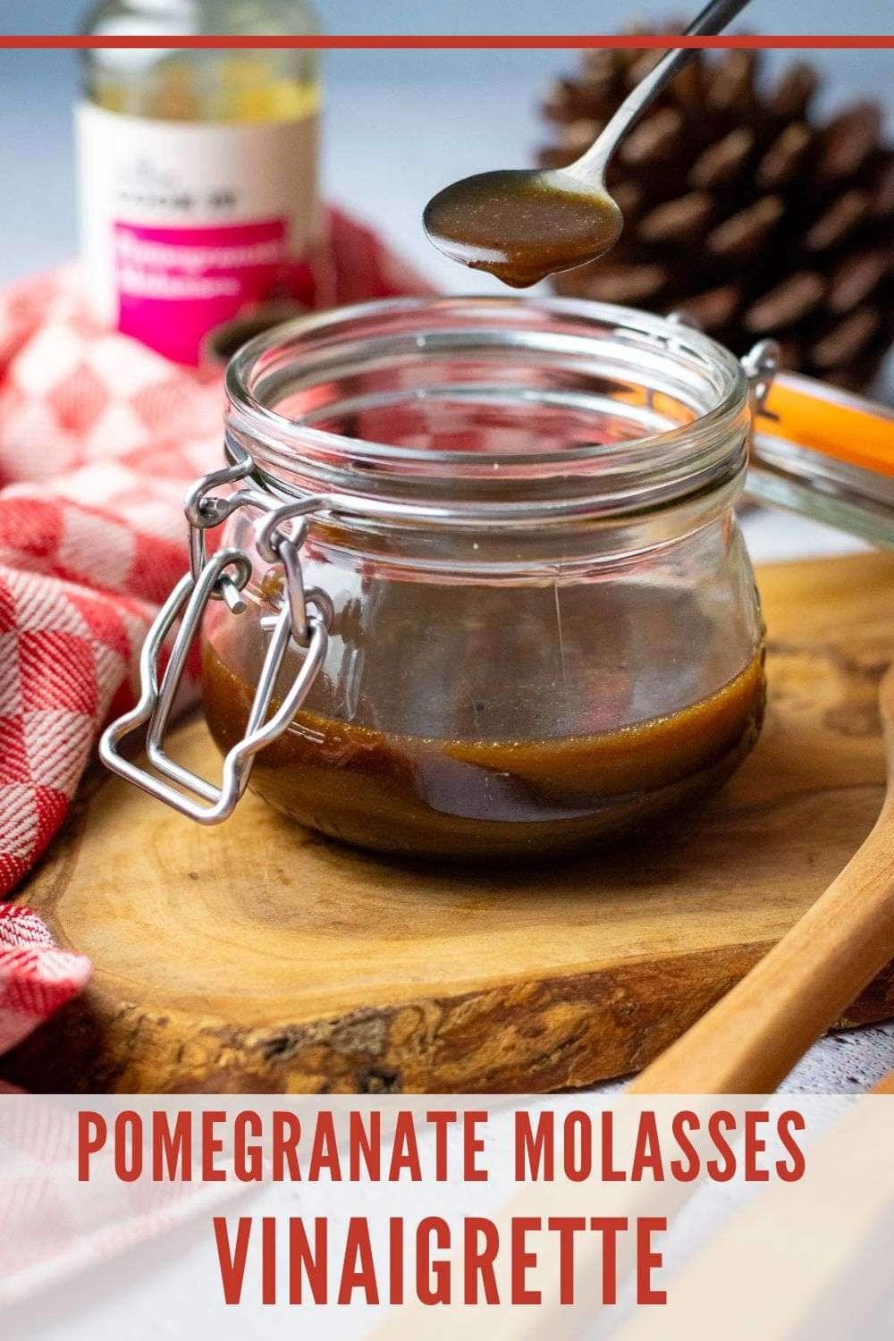 Pomegranate molasses vinaigrette in a mason jar - Pin for Pinterest.