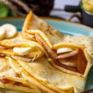 Sourdough Crepes filled with banana slices and caramel.