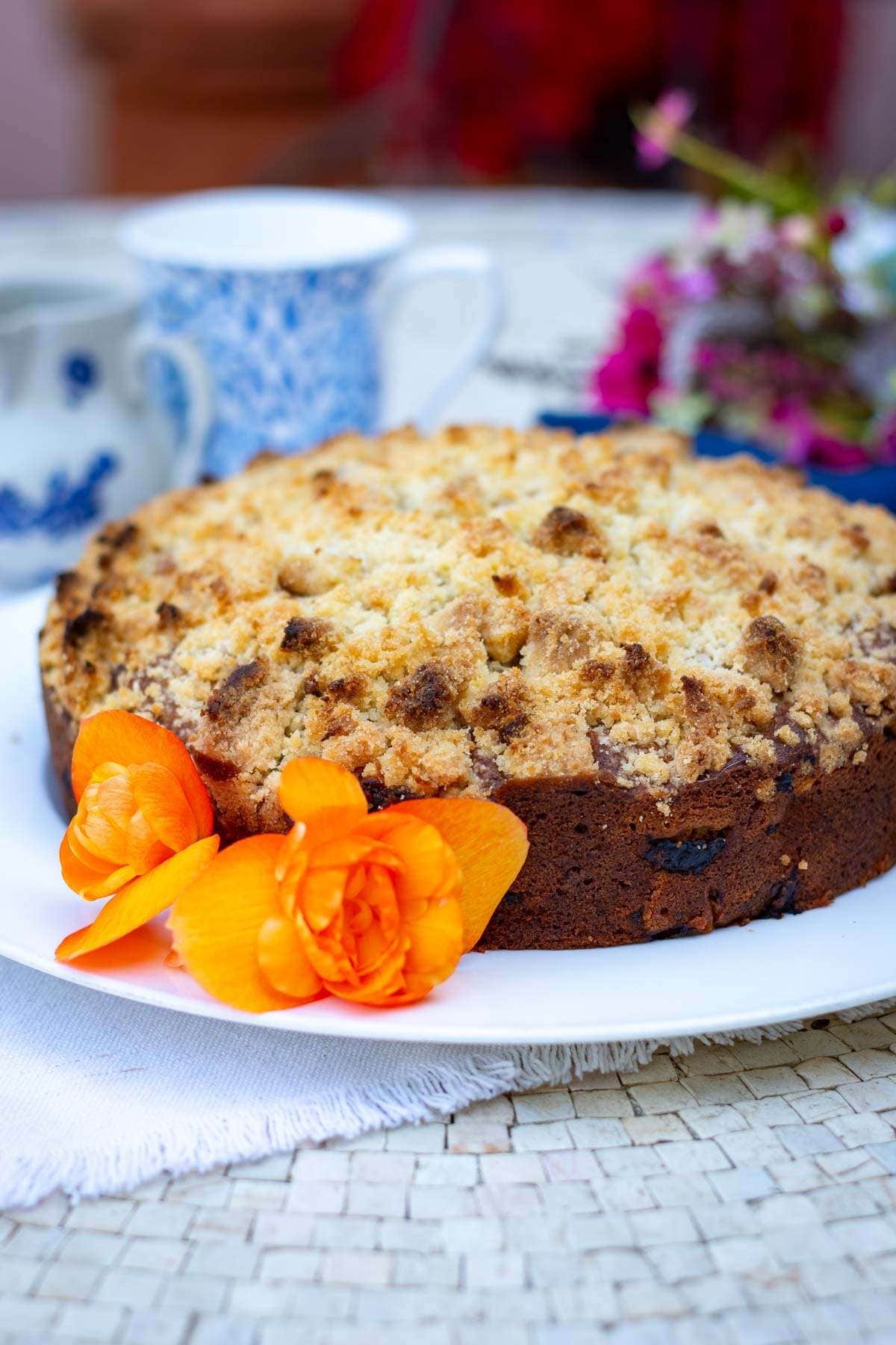Sourdough discard rhubarb cake on a large white plate.