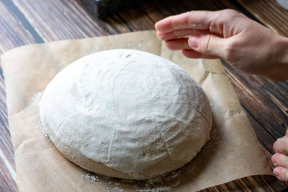 Sourdough on a sheet of parchment paper.