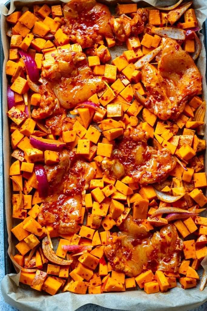 Harissa Chicken Thigh Tray bake before baking.