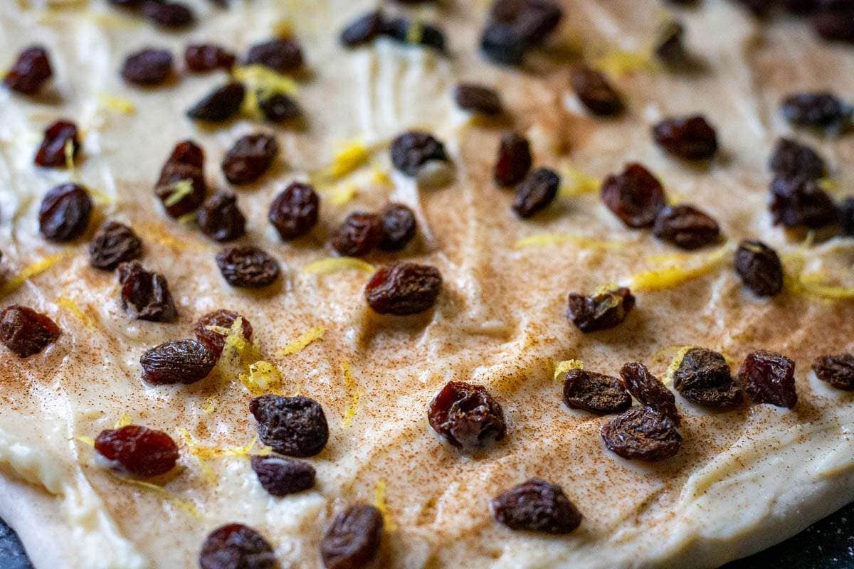 Raisins, zest and cinnamon on top of creme pat.