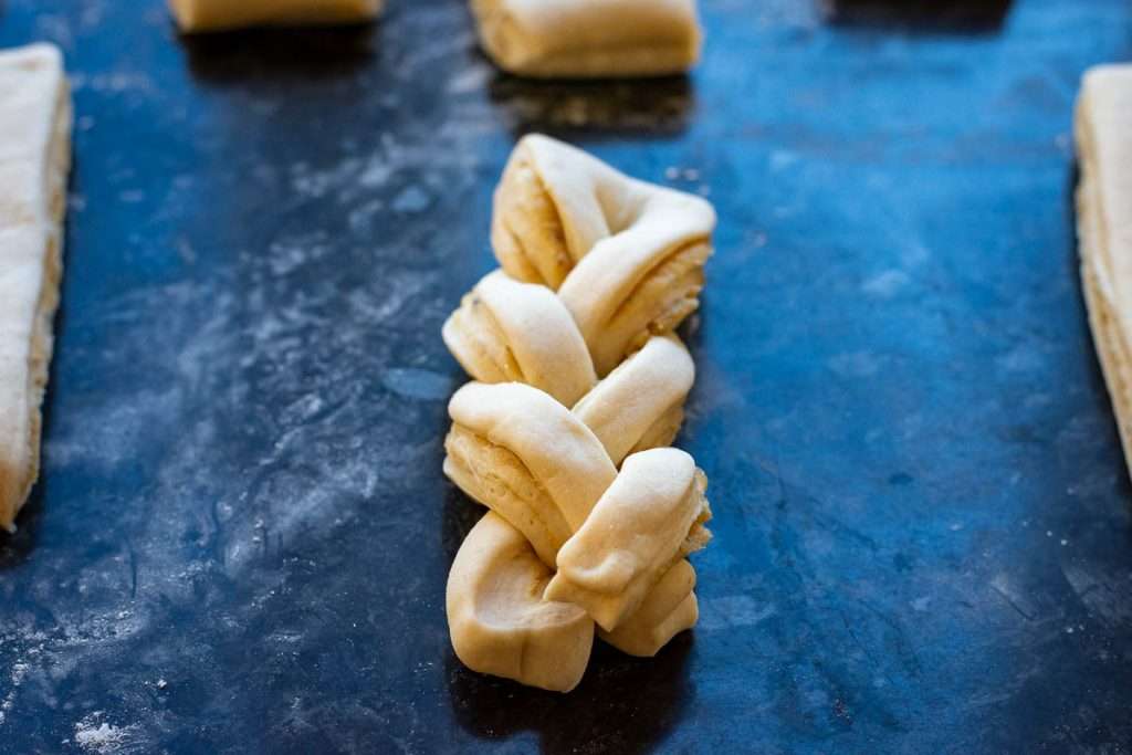 Braided legs of a piece of sourdough.