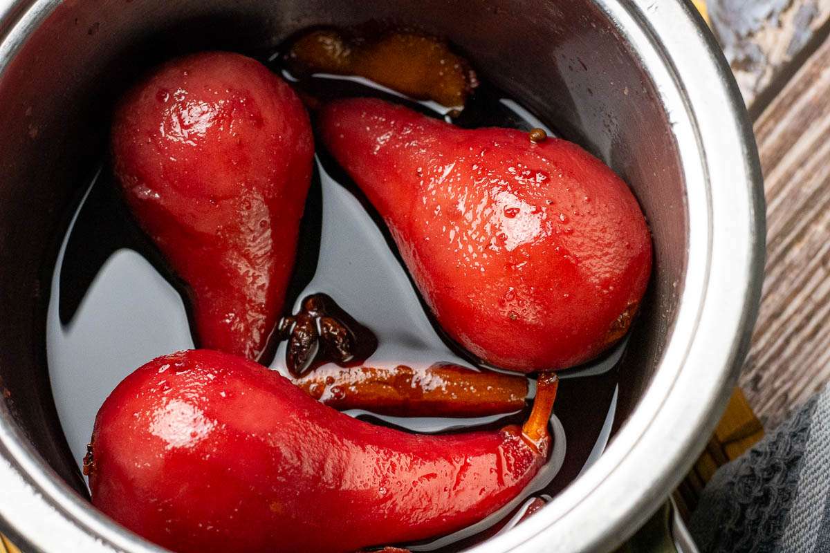 Pears in a mulled wine poaching liquid.