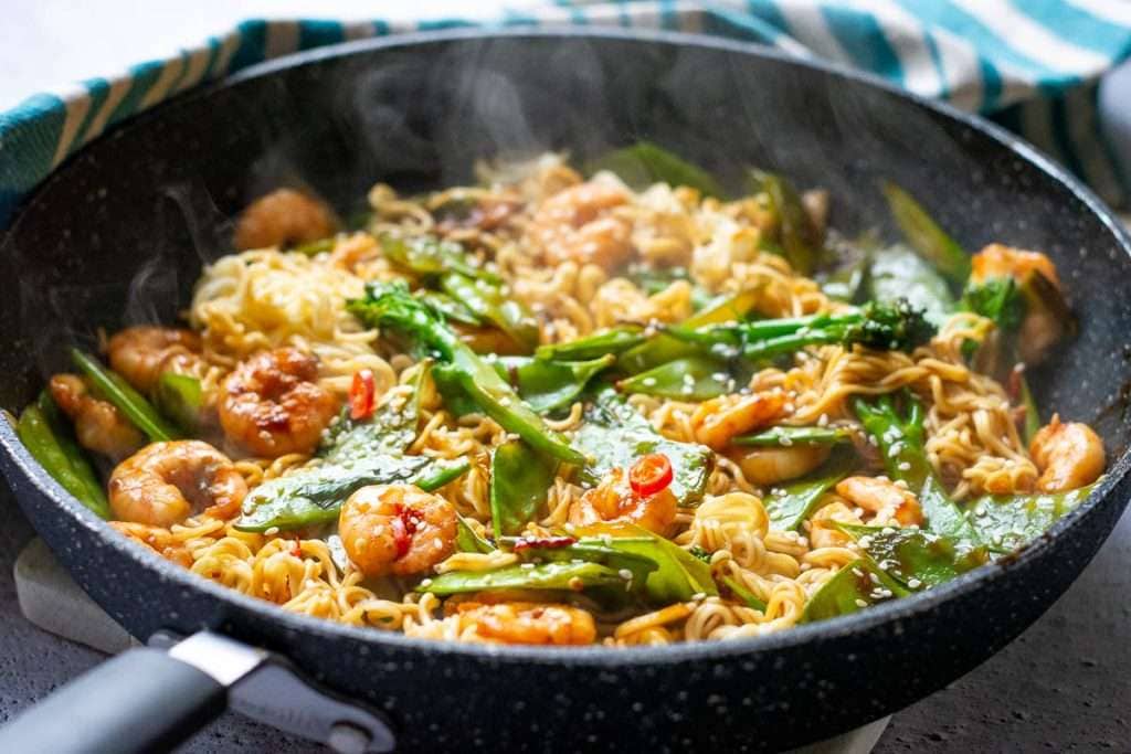 Prawn stir fry is ready in a large pan.