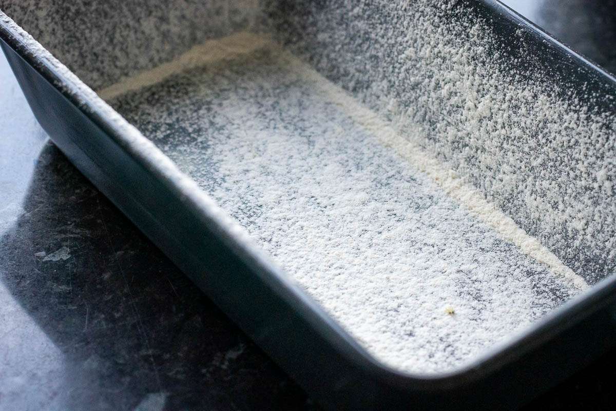 Buttered and floured loaf tin.