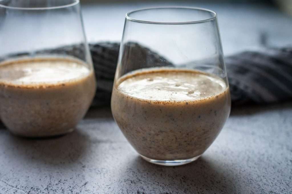 Oat mixture in two glasses ready for overnight soaking.