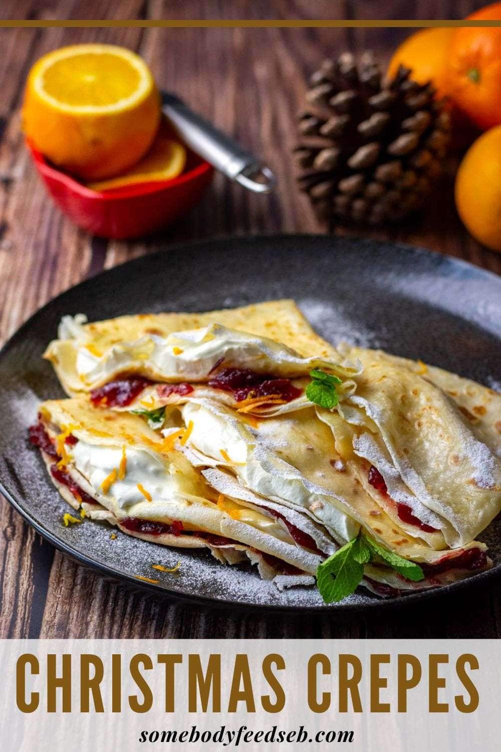 Christmas Crepes filled with orange cream and cranberries Pin for Pinterest.