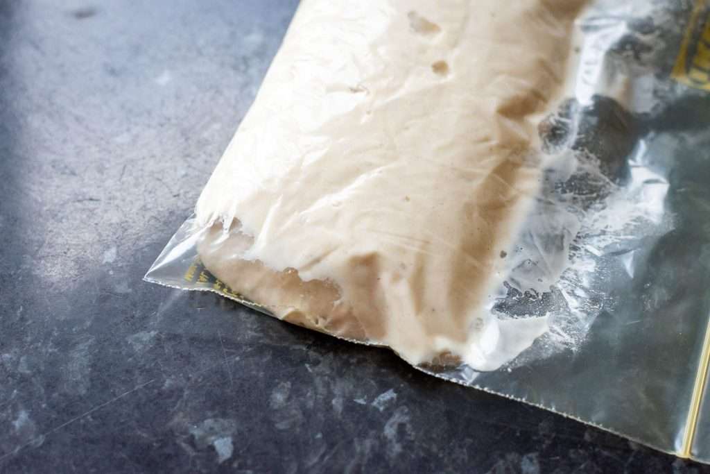 Flour and water mixture for piping the crosses in a small ziplock bag.