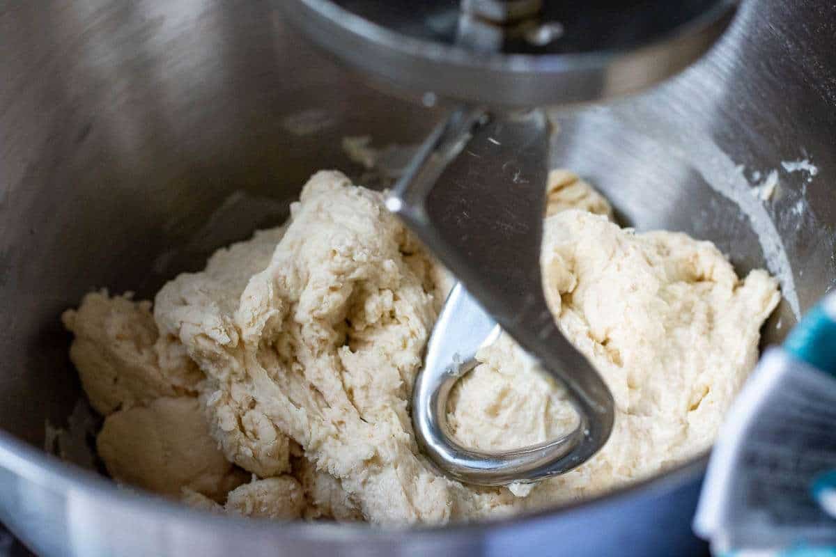 Mixing flour and water to autolyse the dough.