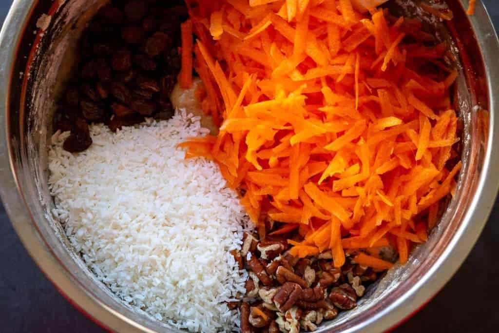Pecans, coconut and grated carrots added to the sourdough cake batter.