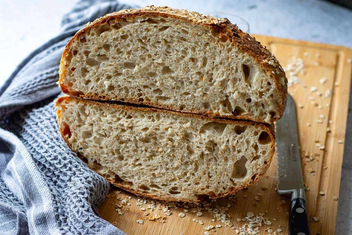 Honey oat sourdough bread made with a sourdough starter fed all-purpose flour.