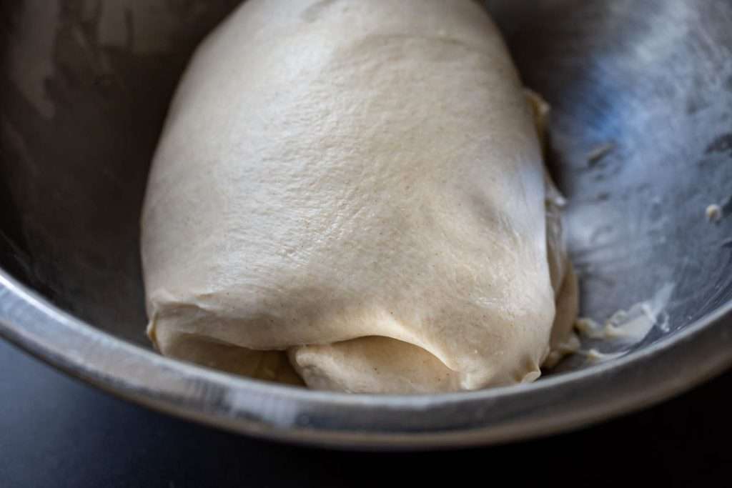 Sourdough coil folded in a large mixing bowl.