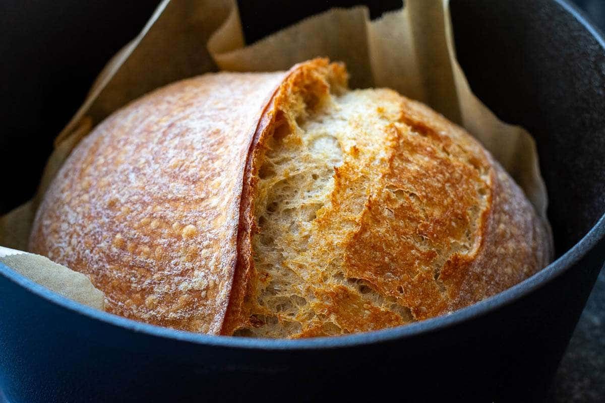 Einkorn flour sourdough with a prominent sourdough ear in a Dutch Oven.
