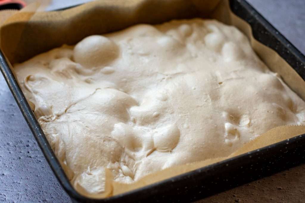 Sourdough focaccia after its second proof.