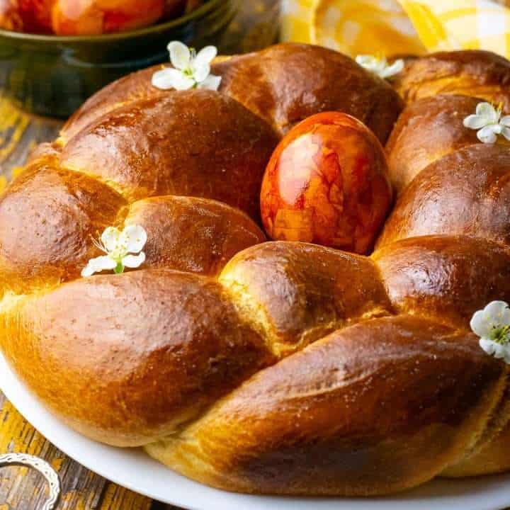 Sourdough Italian Easter bread, known as Pane Di Pasqua with a coloured egg in the middle.