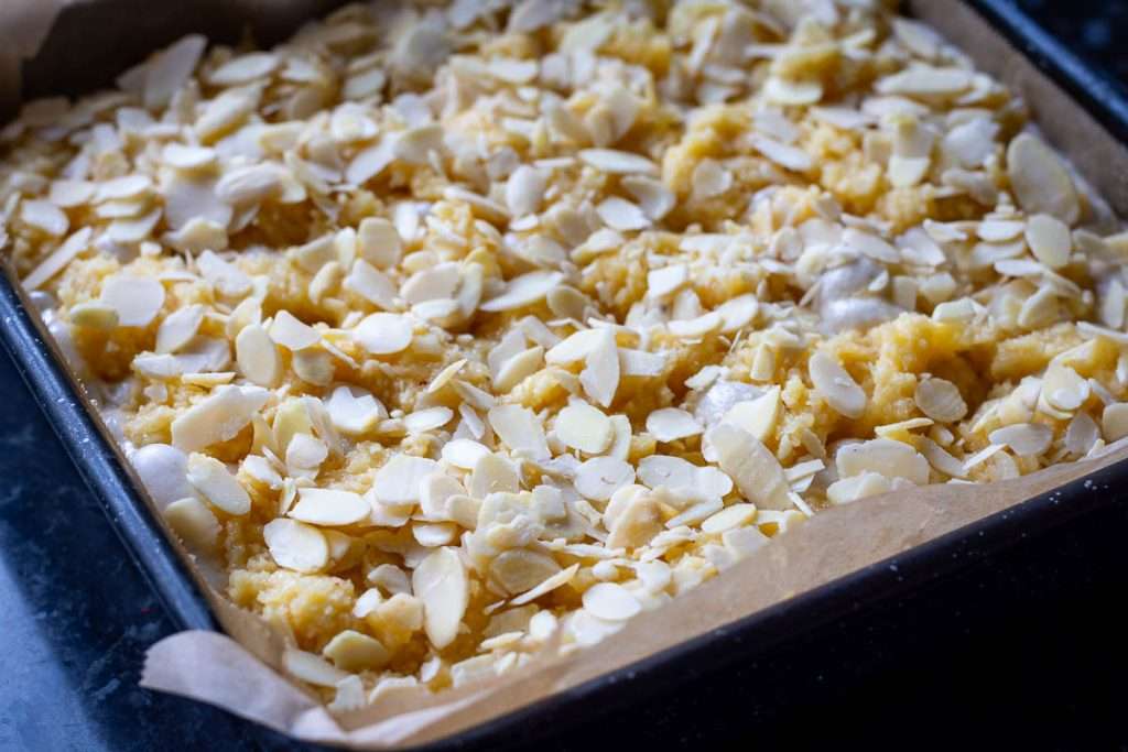 Flaked almonds on top of the almond croissant sourdough focaccia.
