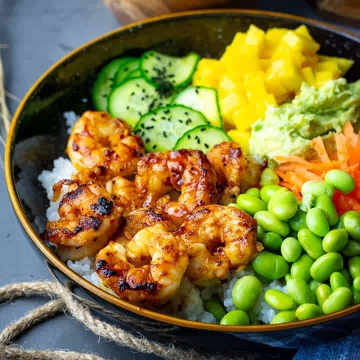 Prawn Poke Bowl with mango, avocado and pickled cucumber.