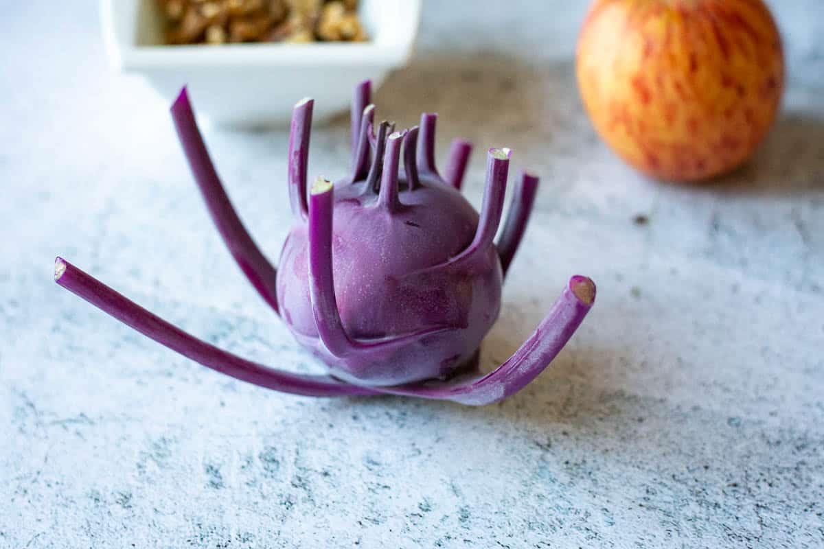Purple kohlrabi on a kitchen surface.