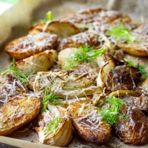 Roasted Fennel and Potatoes with fennel fronds on top.