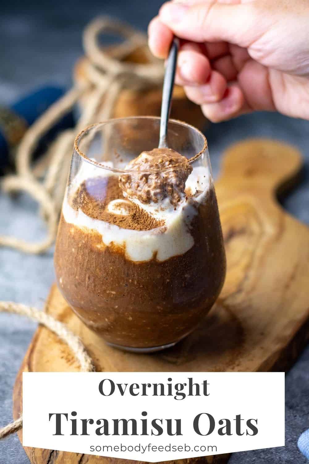 A spoonful of tiramisu overnight oats lifted out of a glass. Pin for Pinterest.