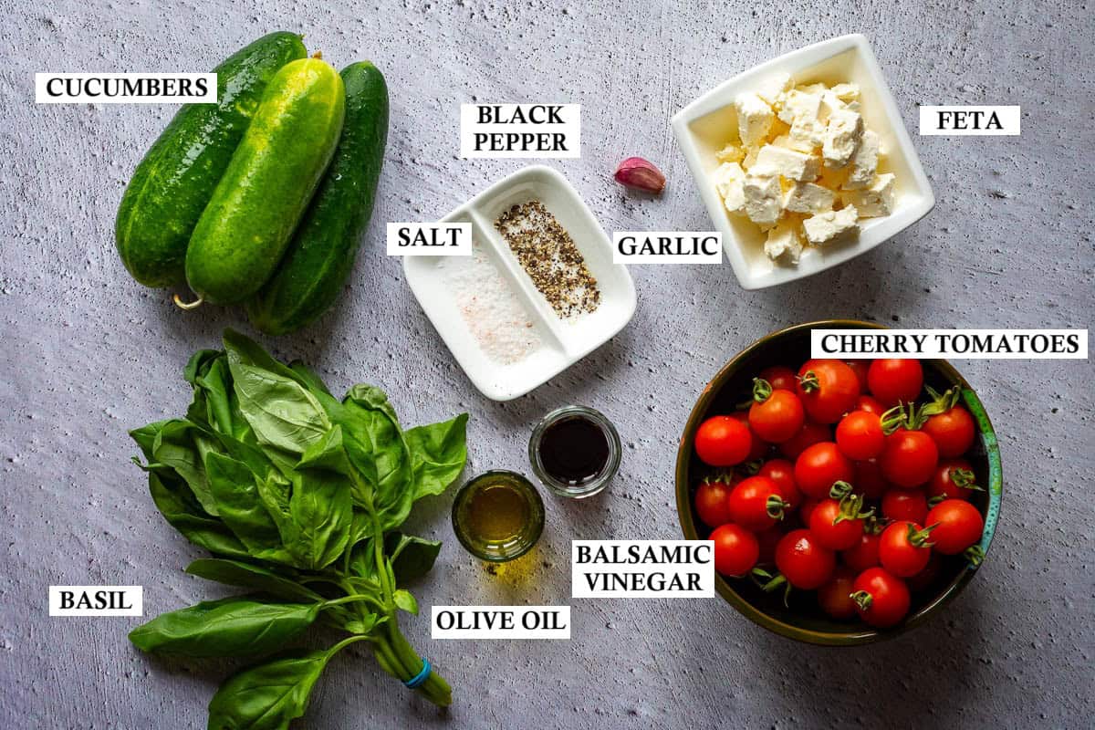 Ingredients for fresh tomato, cucumber and feta salad.