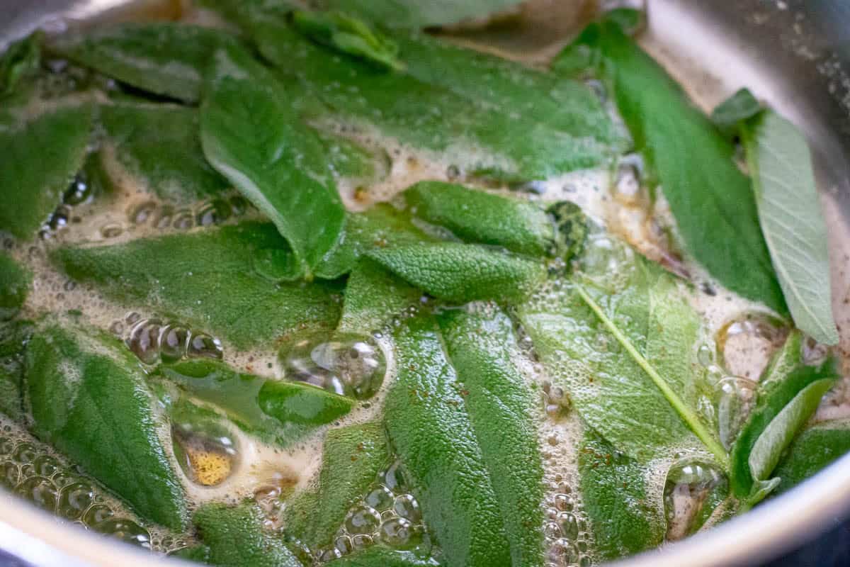 Sage leaves frying in brown butter.