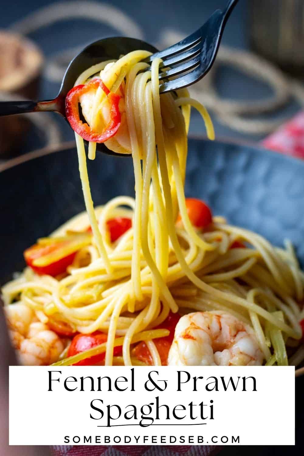 Fennel and Orawn pasta with cherry tomatoes being picked up from the plate with a fork. Pin for Pinterest.