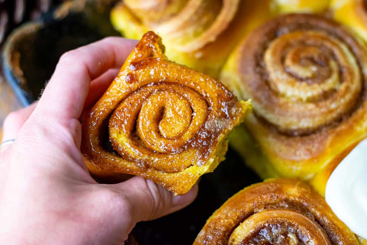 Gooey caramelised base of sourdough pumpkin cinnamon rolls.