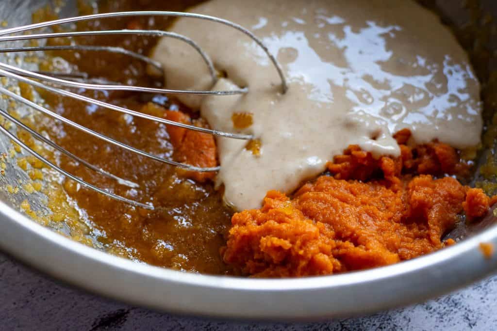 Mixing wet ingredeints for sourdough pumpkin cookies.