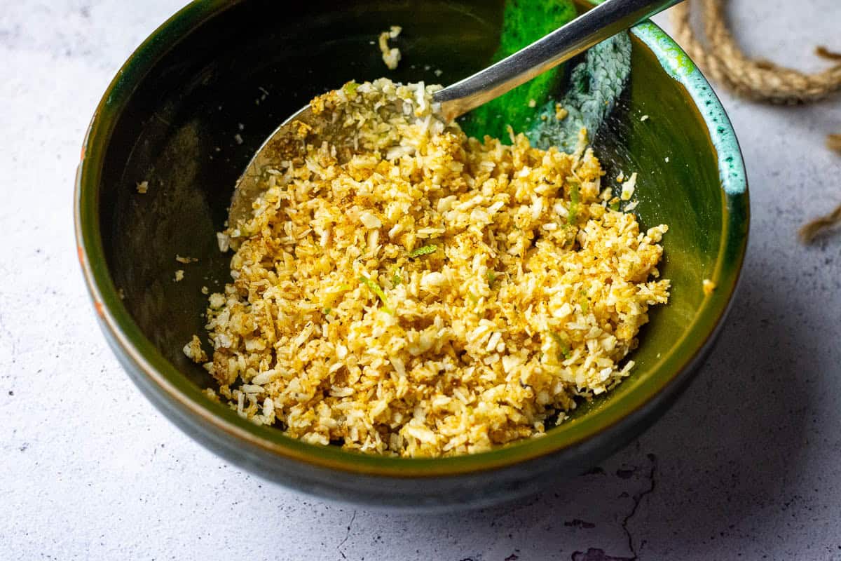 Mixed Ingredeint for coconut panko crust for the chicken in a bowl.