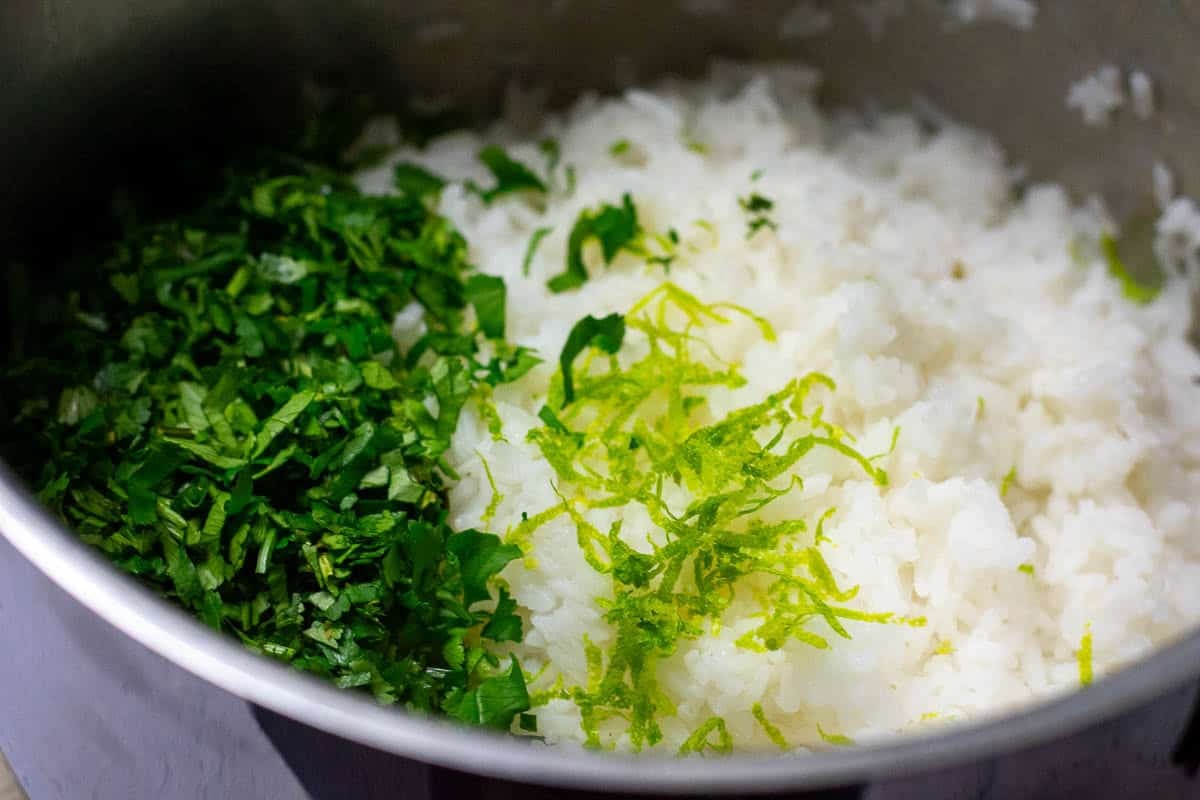Lime zest and fresh coriander added to the cooked rice.