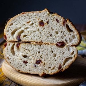 Cranberry Orange Sourdough Bread cut in half.