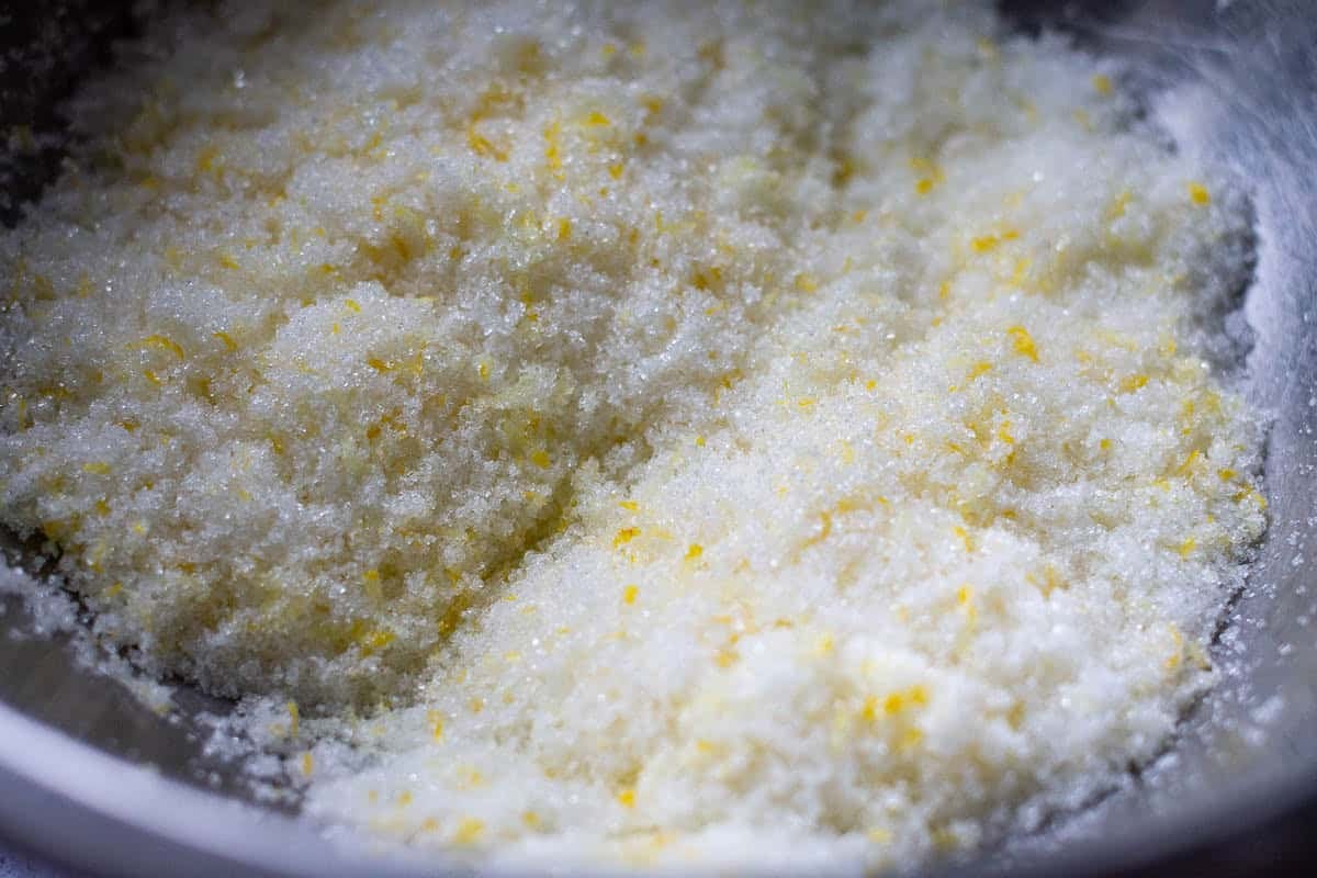 Lemon zest rubbed into sugar in a large bowl.