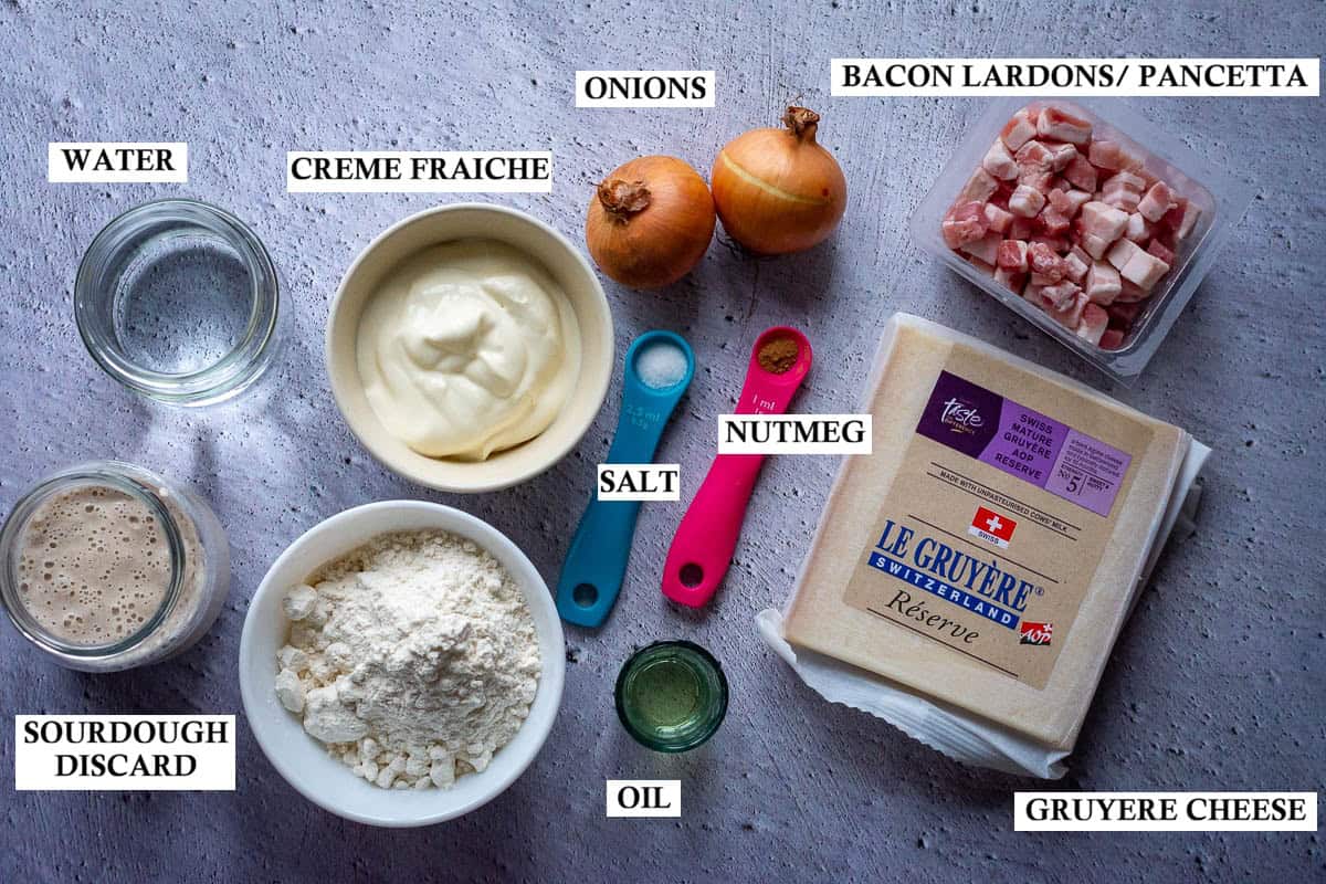Labelled Ingredients for Sourdough Flammkuchen (a.k.a. Sourdough Flambee) on a grey surface.