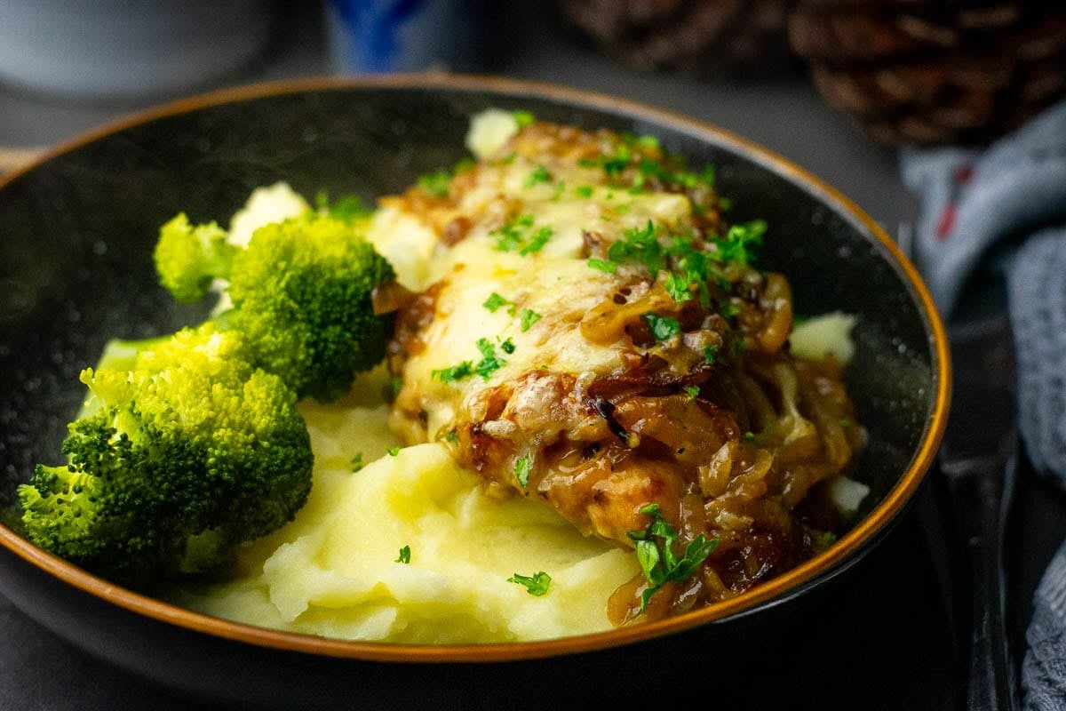 French Onion Chicken served with mashed potatoes and steamed broccoli.